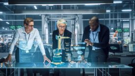 Industry 4.0 High-Tech Factory: Diverse Team of Robotics Engineers Working on Robot Arm Design, Using Augmented Reality Hologram to Manipulate 3D Model by Gestures. Engineering with Digital Technology