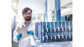 NDT Leak Testing: The man holding the pouch cell