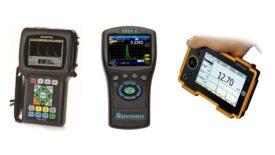 A row of current gauges with a white background.