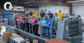 Staff gather for a group photo at Spectrum Custom Packaging, Inc.