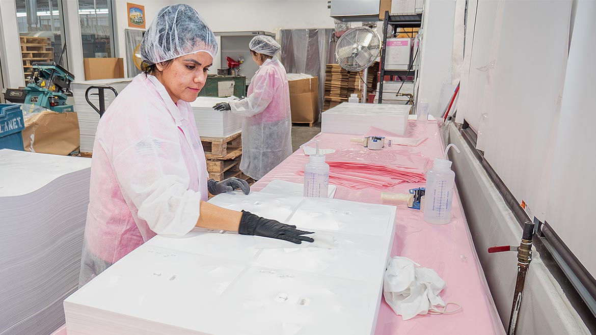 Employees working at Spectrum Custom Packaging