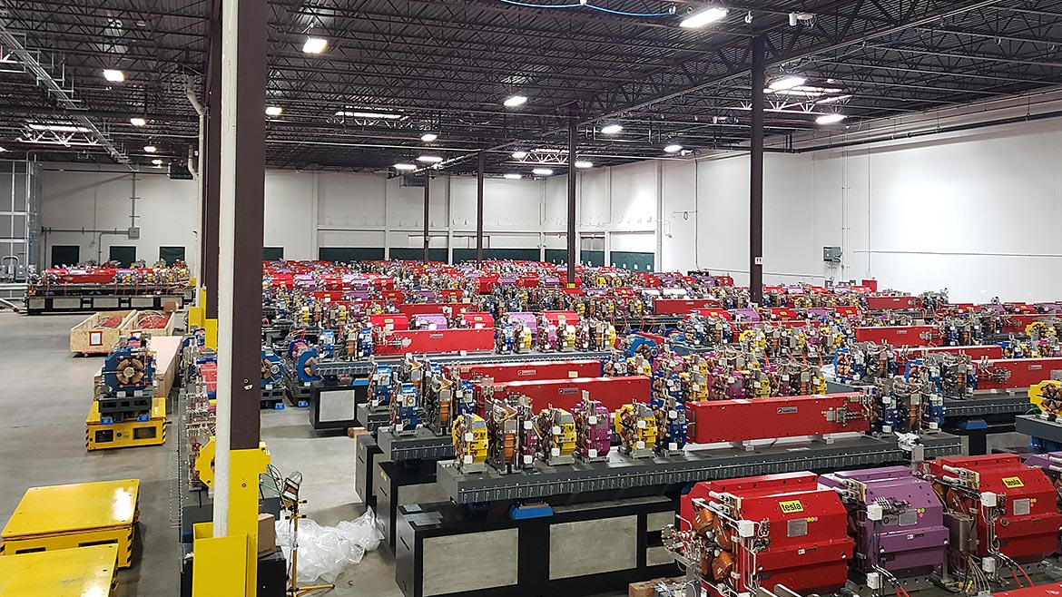 Assembled APS Upgrade accelerator modules in the Building 981 warehouse awaiting installation.
