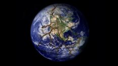 Parched earth with a black background.