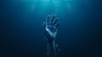 Drowning hand underwater