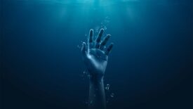 Drowning hand underwater