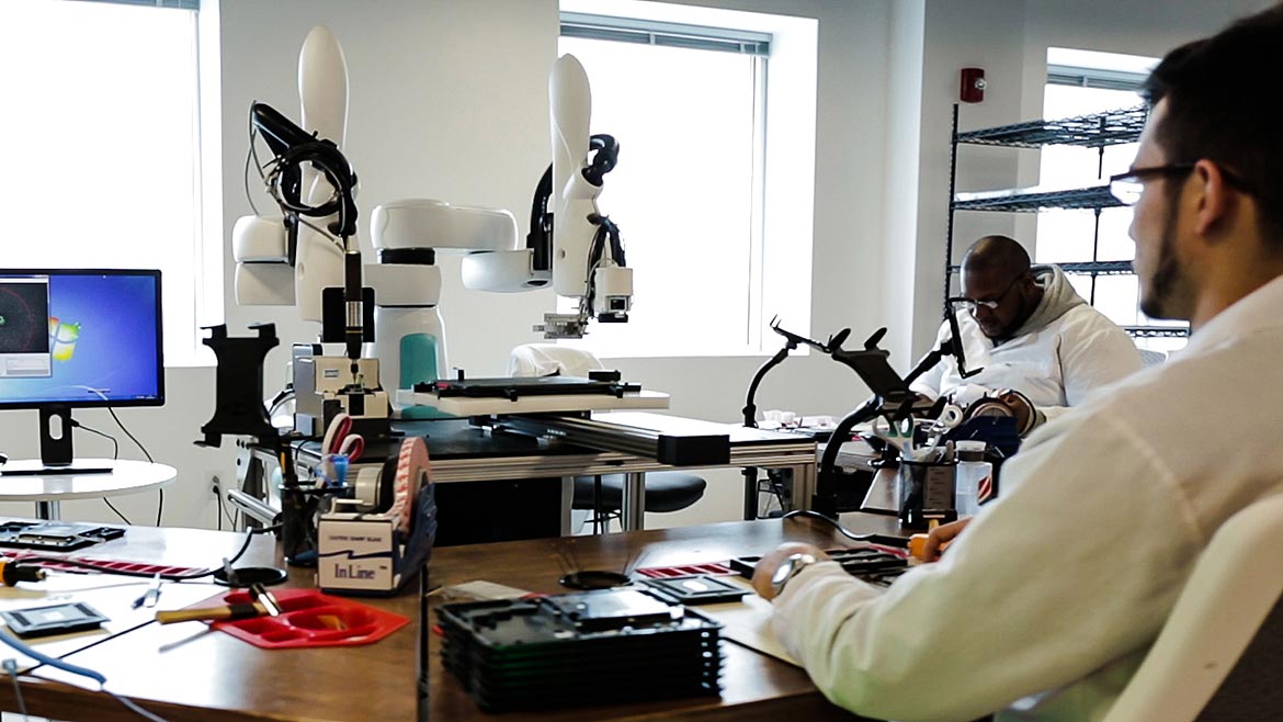 Employees working with automation tools